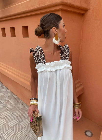 Μακρύ ελαστικό oversize φόρεμα με βολάν και λεοπάρ φαρδιές τιράντες. Υπέροχο για τις καθημερινές σου βόλτες ακόμα και για καλεσμένη σε επίσημο event.