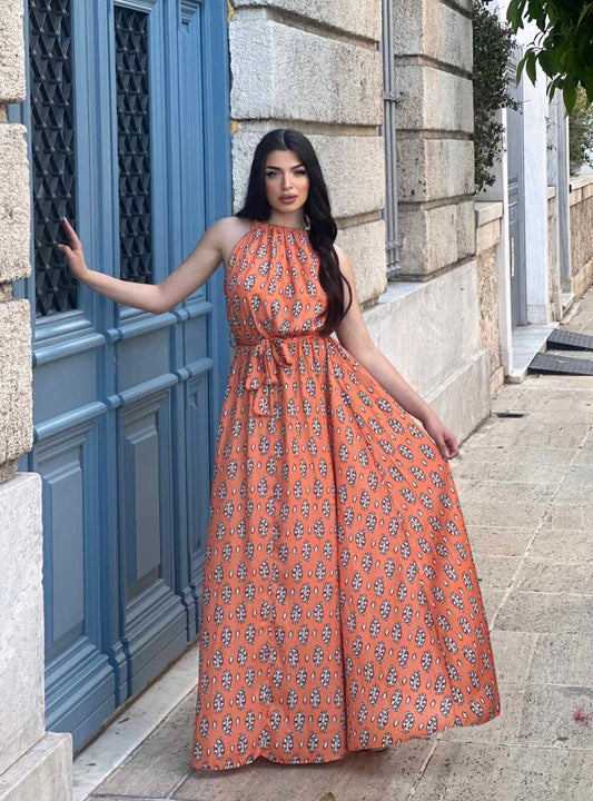 Άνετο oversize φόρεμα μάξι εμπριμέ με λαχούρια και αλυσίδα χρυσή στο λαιμό.Αέρινο δροσερό ύφασμα και άνετη εφαρμογή.
